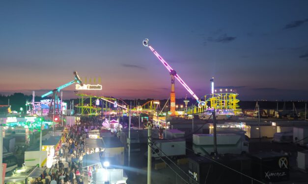 La lluvia respeta a los niños en su día grande en la Feria